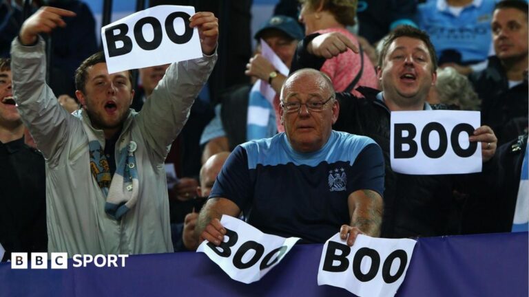 Why do Man City fans boo pre-match anthems?